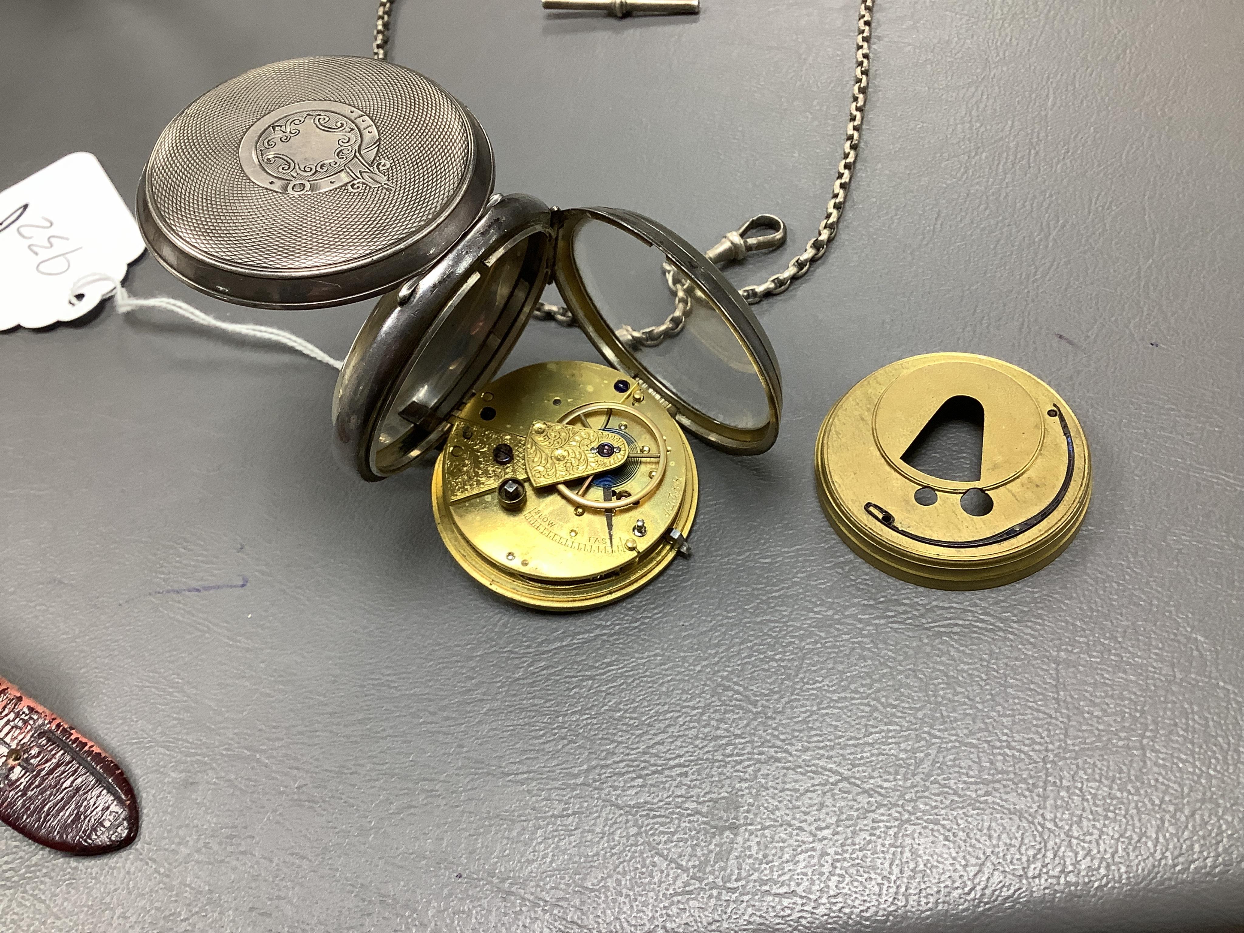 A late Victorian silver open faced keywind pocket watch, together with a Waltham gold plated pocket watch and six other items.